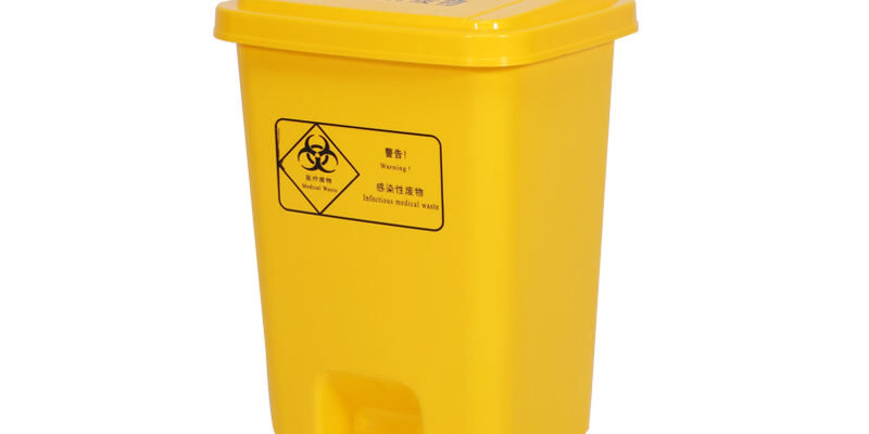 Yellow plastic medical waste bin